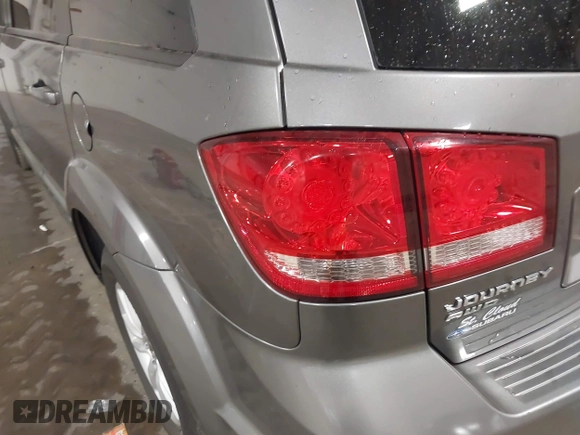 2013 Dodge Journey SXT with VIN 3C4PDDBG4DT600078, listed as a IAAI auction lot 42060076 with 167,943 mi miles and . Bid and sale history available at DreamBid. Image 6.