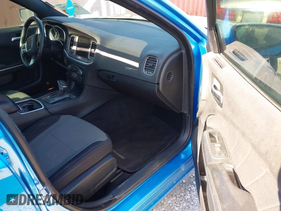 2015 Dodge Charger SXT with VIN 2C3CDXHG1FH866598, listed as a IAAI auction lot 41944761 with 201,163 mi miles and . Bid and sale history available at DreamBid. Image 5.