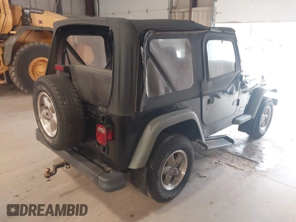 1999 Jeep Wrangler SE with VIN 1J4FY29PXXP409455, listed as a IAAI auction lot 42234313 with 56,252 mi miles and . Bid and sale history available at DreamBid. Image 4.