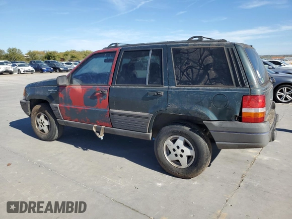 1995 Jeep Grand Cherokee Laredo with VIN 1J4FX58S5SC741328, listed as a Copart auction lot 82034594 with 260,398 mi miles and Clean Title. Bid and sale history available at carsss.com. Image 2.