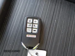 2023 Honda Odyssey Elite z VIN 5FNRL6H98PB017788, wystawiony jako IAAI lot #42312586 z przebiegiem 16 208 mil mil oraz . Historia ofert i sprzedaży dostępna na DreamBid. Obrazek 11.