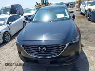2016 Mazda CX-9 Touring with VIN JM3TCACY7G0101632, listed as a IAAI auction lot 42191115 with 163,070 mi miles and . Bid and sale history available at DreamBid. Image 12.