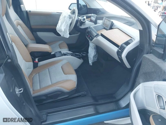 2015 BMW i3 with VIN WBY1Z4C52FV503063, listed as a IAAI auction lot 40644359 with NaN miles. Bid and sale history available at carsss.com. Image 5.