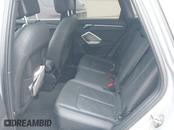 2021 Audi Q3 Premium with VIN WA1AUCF35M1066713, listed as a IAAI auction lot 41395334 with 82,724 mi miles and . Bid and sale history available at DreamBid. Image 8.