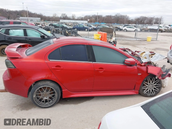 2016 Mitsubishi Lancer GT with VIN JA32U8FW1GU012988, listed as a IAAI auction lot 41498905 with 94,727 mi miles. Bid and sale history available at carsss.com. Image 12.