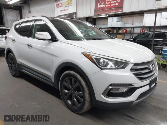 2017 Hyundai Santa Fe Ultimate with VIN 5NMZW4LA0HH040141, listed as a IAAI auction lot 42603243 with 140,817 mi miles and . Bid and sale history available at DreamBid. Image 1.