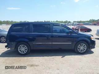 2014 Dodge Grand Caravan SXT with VIN 2C4RDGCG3ER266199, listed as a IAAI auction lot 42119064 with 148,067 mi miles and . Bid and sale history available at DreamBid. Image 14.