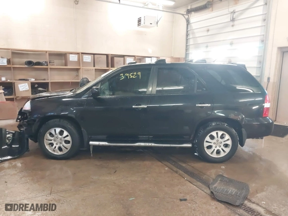 2003 Acura MDX Touring Pkg RES w/Navigation System with VIN 2HNYD18923H530593, listed as a IAAI auction lot 41639529 with 274,939 mi miles. Bid and sale history available at carsss.com. Image 15.