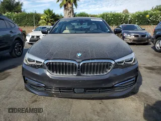 2020 BMW 5 Series 530e with VIN WBAJA9C08LCD44034, listed as a Copart auction lot 63664454 with 97,595 mi miles and Salvage Title. Bid and sale history available at DreamBid. Image 5.