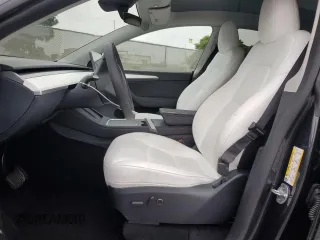 2024 Tesla Model Y z VIN 7SAYGDED4RF103411, wystawiony jako Copart lot #59982815 z przebiegiem 17 601 mil mil oraz Szkoda całkowita • Salvage title. Historia ofert i sprzedaży dostępna na DreamBid. Obrazek 7.