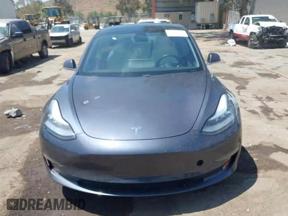 2020 Tesla Model 3 Standard Range Plus with VIN 5YJ3E1EAXLF615781, listed as a IAAI auction lot 42068935 with 96,026 mi miles. Bid and sale history available at carsss.com. Image 12.