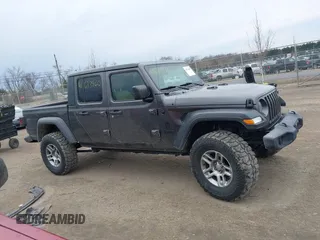 2020 Jeep Gladiator Sport S with VIN 1C6HJTAG8LL141535, listed as a IAAI auction lot 41673860 with 67,160 mi miles. Bid and sale history available at carsss.com. Image 13.