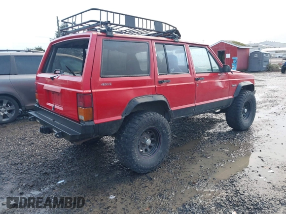 1996 Jeep Cherokee Sport with VIN 1J4FJ68S4TL244893, listed as a IAAI auction lot 41190369 with 192,459 mi miles and . Bid and sale history available at DreamBid. Image 4.