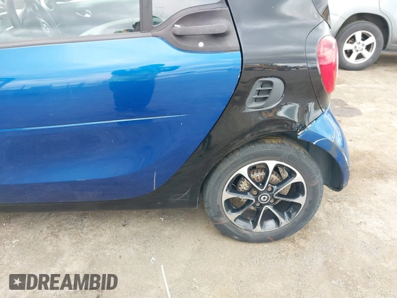 2016 Smart fortwo Passion z VIN WMEFJ5DA8GK059871, wystawiony jako IAAI lot #41624917 z przebiegiem 90 906 mil mil oraz . Historia ofert i sprzedaży dostępna na DreamBid. Obrazek 6.