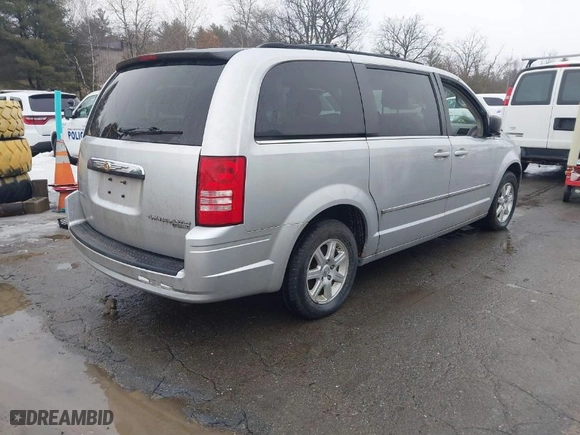 2010 Chrysler Town & Country Touring with VIN 2A4RR5D11AR493377, listed as a IAAI auction lot 41659818 with 114,780 mi miles. Bid and sale history available at carsss.com. Image 4.
