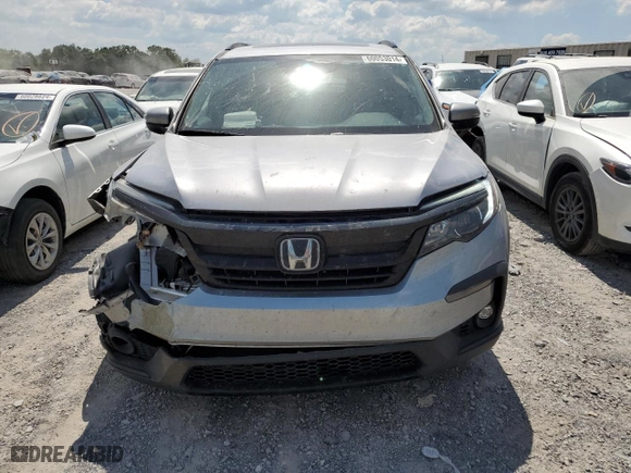 2021 Honda Pilot Special Edition with VIN 5FNYF5H25MB003794, listed as a Copart auction lot 60053014 with 56,787 mi miles and Salvage Title. Bid and sale history available at carsss.com. Image 5.