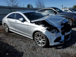 2015 Mercedes-Benz CLS-Class CLS 400 with VIN WDDLJ6HB9FA148000, listed as a Copart auction lot 52300255 with 98,709 mi miles and Salvage Title. Bid and sale history available at carsss.com. Image 4.
