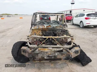 2021 Jeep Wrangler Unlimited Freedom with VIN 1C4HJXDN8MW765099, listed as a IAAI auction lot 42394438 with Not provided miles and . Bid and sale history available at DreamBid. Image 6.