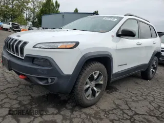 2014 Jeep Cherokee Trailhawk z VIN 1C4PJMBS8EW156633, wystawiony jako Copart lot #58197675 z przebiegiem 133 029 mil mil oraz Tytuł czysty. Historia ofert i sprzedaży dostępna na DreamBid. Obrazek 1.