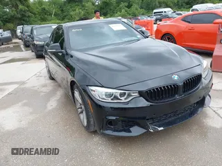 2014 BMW 4 Series 428i with VIN WBA3N7C58EF719495, listed as a IAAI auction lot 42490625 with 179,410 mi miles and . Bid and sale history available at DreamBid. Image 1.