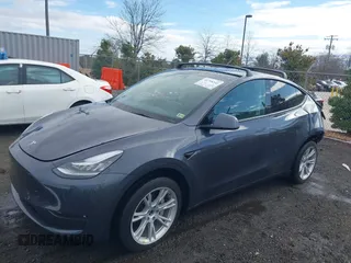2023 Tesla Model Y Long Range with VIN 7SAYGDEE8PF599254, listed as a IAAI auction lot 41718342 with 24,339 mi miles and . Bid and sale history available at carsss.com. Image 2.