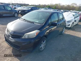 2013 Toyota Yaris L with VIN JTDKTUD35DD548148, listed as a IAAI auction lot 41939847 with 336,231 mi miles. Bid and sale history available at carsss.com. Image 2.