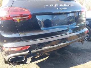 2016 Porsche Cayenne with VIN WP1AA2A28GKA37162, listed as a IAAI auction lot 41424921 with 95,717 mi miles. Bid and sale history available at carsss.com. Image 6.