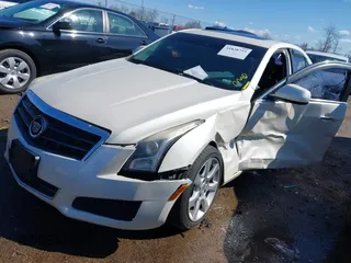 2014 Cadillac ATS Standard AWD with VIN 1G6AG5RX0E0101806, listed as a IAAI auction lot 41828755 with 114,857 mi miles and . Bid and sale history available at carsss.com. Image 16.