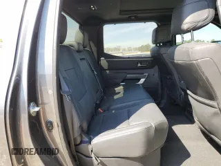 2023 Toyota Tundra Platinum with VIN 5TFNA5DBXPX073809, listed as a Copart auction lot 51221005 with 60,726 mi miles and Salvage title. Bid and sale history available at DreamBid. Image 10.