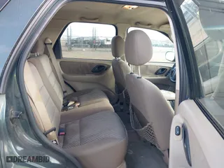 2003 Ford Escape XLT Popular 2 with VIN 1FMYU93113KE18944, listed as a IAAI auction lot 42056372 with 244,942 mi miles. Bid and sale history available at carsss.com. Image 8.