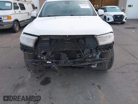 2015 Dodge Durango SXT with VIN 1C4RDJAG1FC745974, listed as a IAAI auction lot 41392820 with 124,861 mi miles and . Bid and sale history available at DreamBid. Image 6.