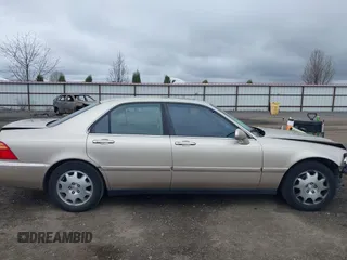 2000 Acura RL with VIN JH4KA9657YC008473, listed as a IAAI auction lot 41935155 with 216,629 mi miles. Bid and sale history available at carsss.com. Image 14.
