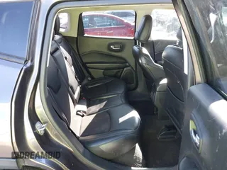 2020 Jeep Compass Latitude with VIN 3C4NJCBB4LT177001, listed as a IAAI auction lot 41210982 with 77,764 mi miles and . Bid and sale history available at DreamBid. Image 8.