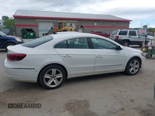 2013 Volkswagen CC Sport z VIN WVWAN7AN6DE537246, wystawiony jako IAAI lot #42361502 z przebiegiem 192 999 mil mil oraz . Historia ofert i sprzedaży dostępna na DreamBid. Obrazek 14.