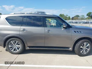 2015 Infiniti QX80 z VIN JN8AZ2NC8F9370971, wystawiony jako IAAI lot #40405096 z przebiegiem 71 990 mil mil oraz . Historia ofert i sprzedaży dostępna na DreamBid. Obrazek 14.