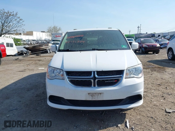 2016 Dodge Grand Caravan SXT with VIN 2C4RDGCG5GR275876, listed as a IAAI auction lot 42121344 with 140,652 mi miles. Bid and sale history available at carsss.com. Image 6.