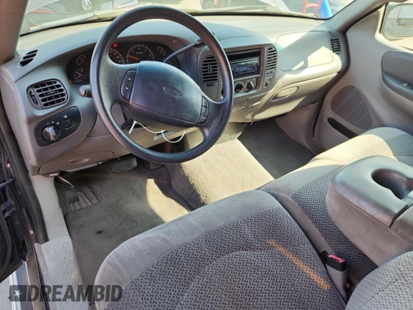 1999 Ford F-150 with VIN 1FTZX1729XNB58298, listed as a Copart auction lot 62369755 with 165,150 mi miles and Clean title. Bid and sale history available at DreamBid. Image 8.