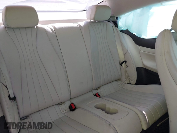 2018 Mercedes-Benz E-Class E 400 with VIN WDD1J6GB6JF020527, listed as a IAAI auction lot 37938951 with 62,697 mi miles. Bid and sale history available at carsss.com. Image 8.