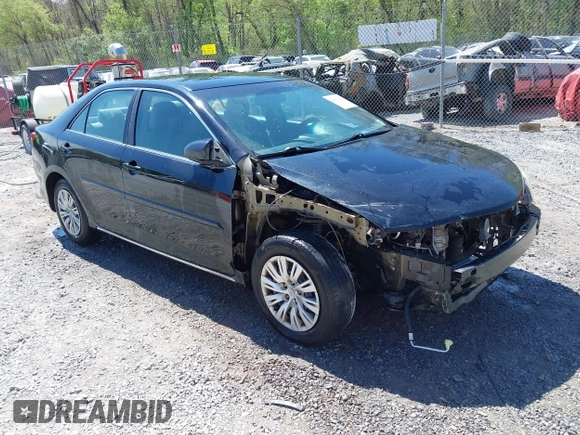 2014 Toyota Camry L with VIN 4T4BF1FK9ER408973, listed as a IAAI auction lot 42074491 with 183,934 mi miles and . Bid and sale history available at DreamBid. Image 1.