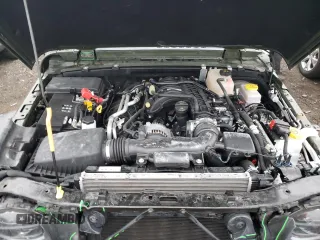 2023 Jeep Wrangler Sport S with VIN 1C4HJXDG1PW504242, listed as a Copart auction lot 83772924 with 29,237 mi miles and Salvage Title. Bid and sale history available at DreamBid. Image 12.