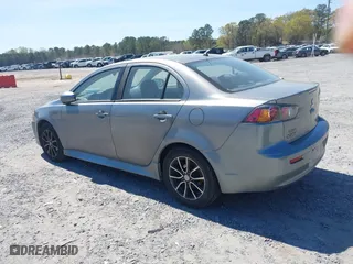 2017 Mitsubishi Lancer ES with VIN JA32U2FU1HU007318, listed as a IAAI auction lot 41908084 with 159,564 mi miles. Bid and sale history available at carsss.com. Image 3.