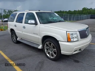 2005 Cadillac Escalade z VIN 1GYEK63N55R123817, wystawiony jako IAAI lot #42263549 z przebiegiem 297 279 mil mil oraz . Historia ofert i sprzedaży dostępna na DreamBid. Obrazek 1.