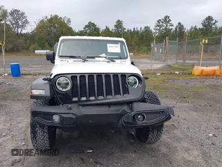 2021 Jeep Wrangler Unlimited Willys with VIN 1C4HJXDN0MW685716, listed as a IAAI auction lot 40837088 with 35,881 mi miles and . Bid and sale history available at DreamBid. Image 12.
