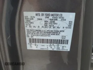 2006 Ford Escape XLT with VIN 1FMYU03136KD47701, listed as a Copart auction lot 58008695 with 176,341 mi miles and Salvage title. Bid and sale history available at DreamBid. Image 13.