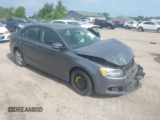 2012 Volkswagen Jetta TDI w/Premium & Nav z VIN 3VWLL7AJ1CM394756, wystawiony jako IAAI lot #42378030 z przebiegiem 130 515 mil mil oraz . Historia ofert i sprzedaży dostępna na DreamBid. Obrazek 1.