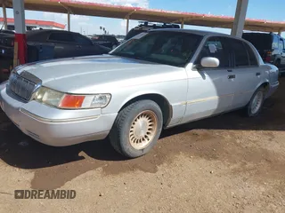 2002 Mercury Grand Marquis LS Premium with VIN 2MEFM75W32X622468, listed as a IAAI auction lot 42044691 with 230,738 mi miles and . Bid and sale history available at DreamBid. Image 2.