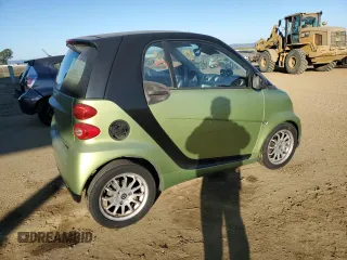 2012 Smart fortwo Pure z VIN WMEEJ3BA7CK543415, wystawiony jako Copart lot #42707385 z przebiegiem 76 280 mil mil oraz Szkody całkowita. Historia ofert i sprzedaży dostępna na DreamBid. Obrazek 3.