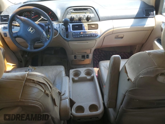 2005 Honda Odyssey EX-L with VIN 5FNRL38625B045152, listed as a Copart auction lot 57633005 with 145,776 mi miles and Salvage title. Bid and sale history available at DreamBid. Image 8.