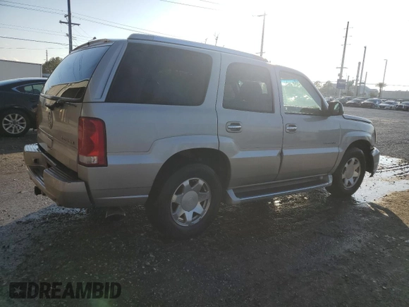 2004 Cadillac Escalade with VIN 1GYEC63T94R208993, listed as a Copart auction lot 87224664 with 285,642 mi miles and Salvage title. Bid and sale history available at DreamBid. Image 3.