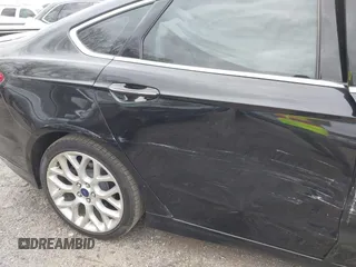 2014 Ford Fusion Titanium with VIN 3FA6P0K92ER355539, listed as a IAAI auction lot 41851471 with 178,176 mi miles and . Bid and sale history available at DreamBid. Image 14.
